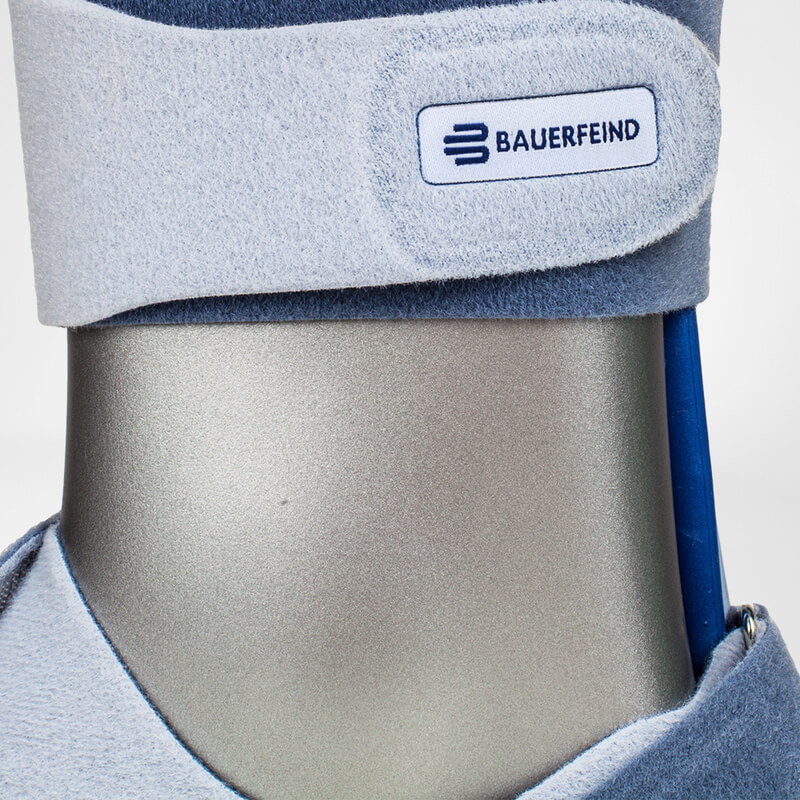 Close-up view of the textured blue CaligaLoc Ankle Splint cushion