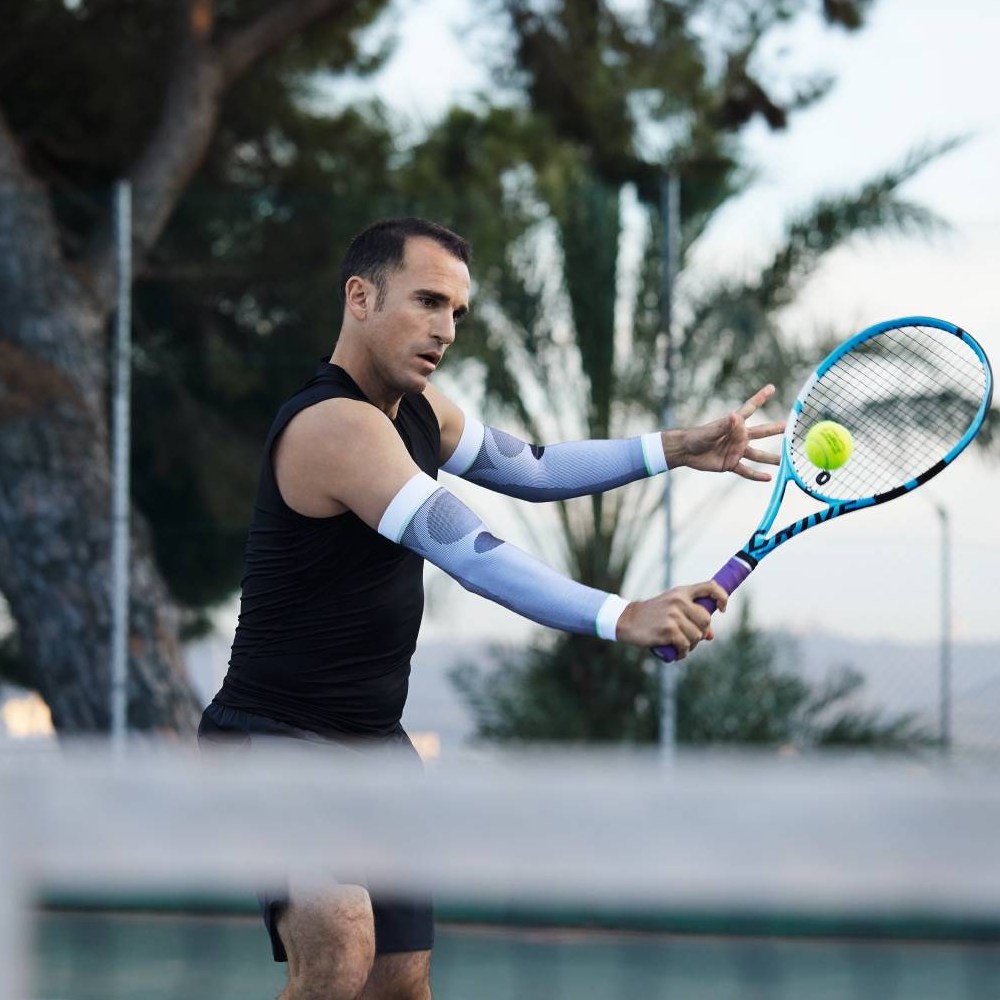 Image of tennis player wearing Sports Compression Sleeves Arm