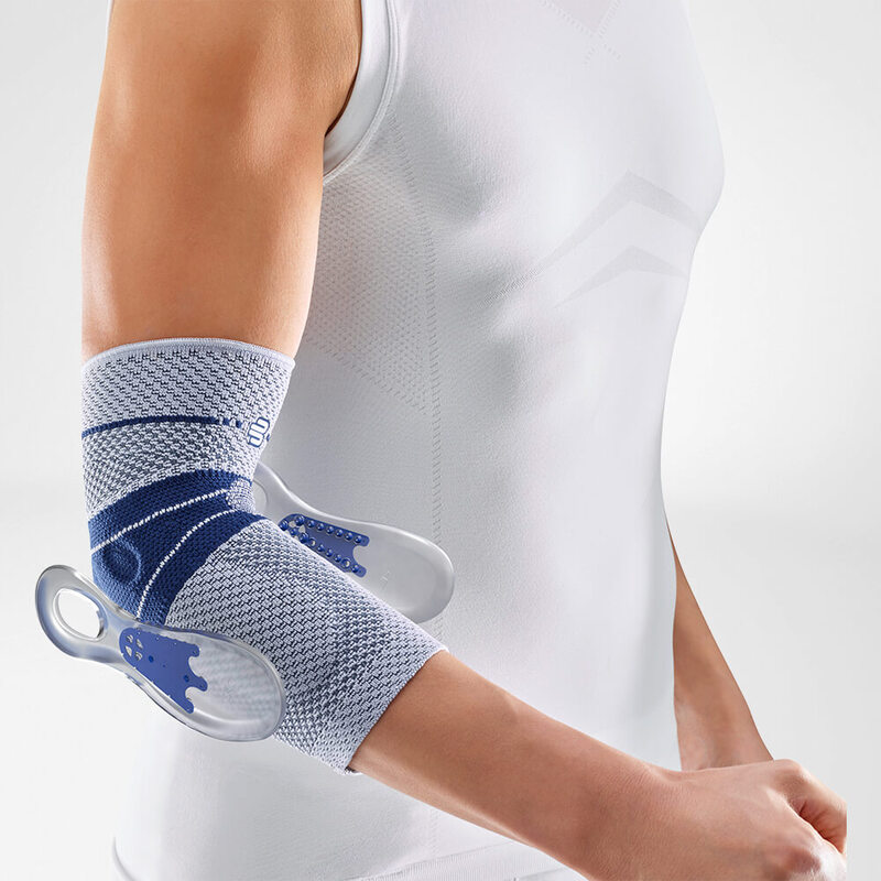 Close-up image of a person wearing Bauerfeind's EpiTrain elbow brace, highlighting its Epicon+ Pads.