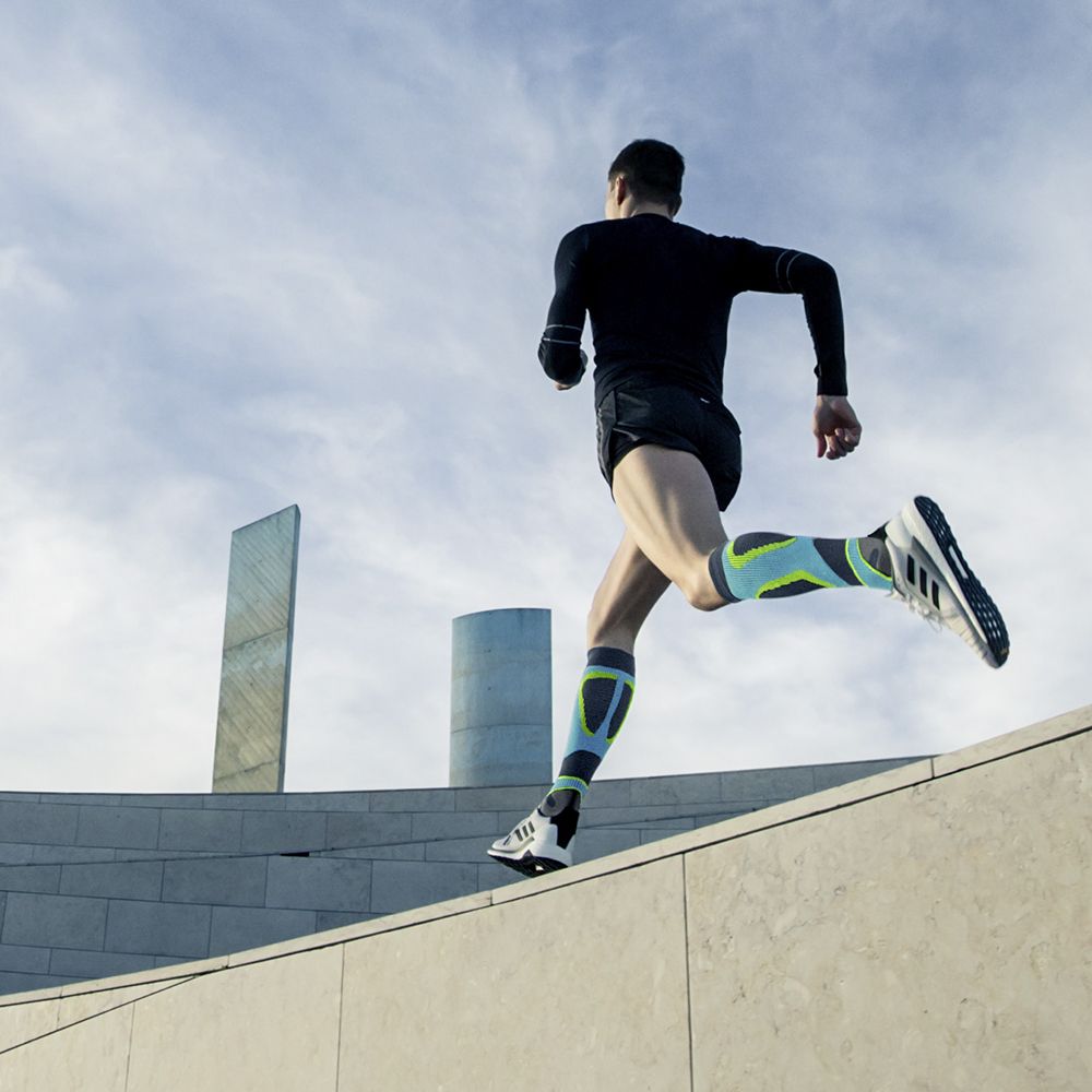 Image of man athlete wearing Run Performance Compression Socks