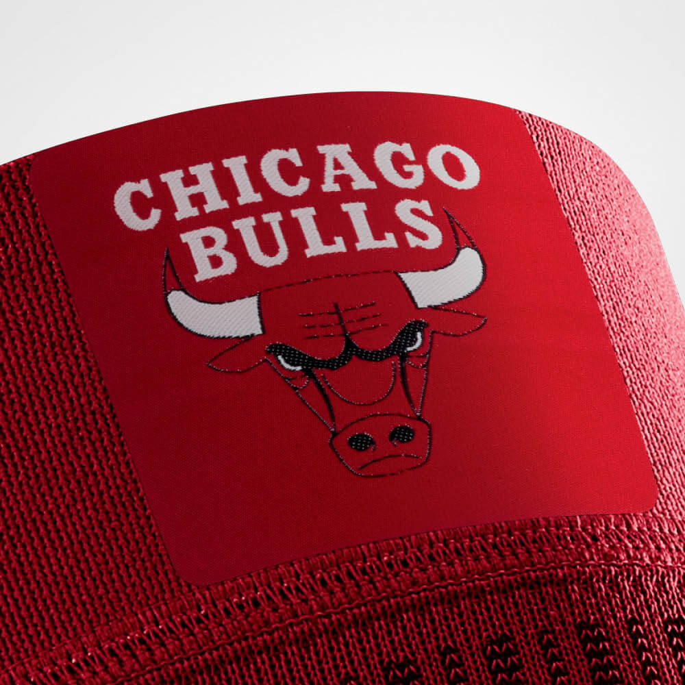 Close-up of Chicago Bulls logo on red fabric