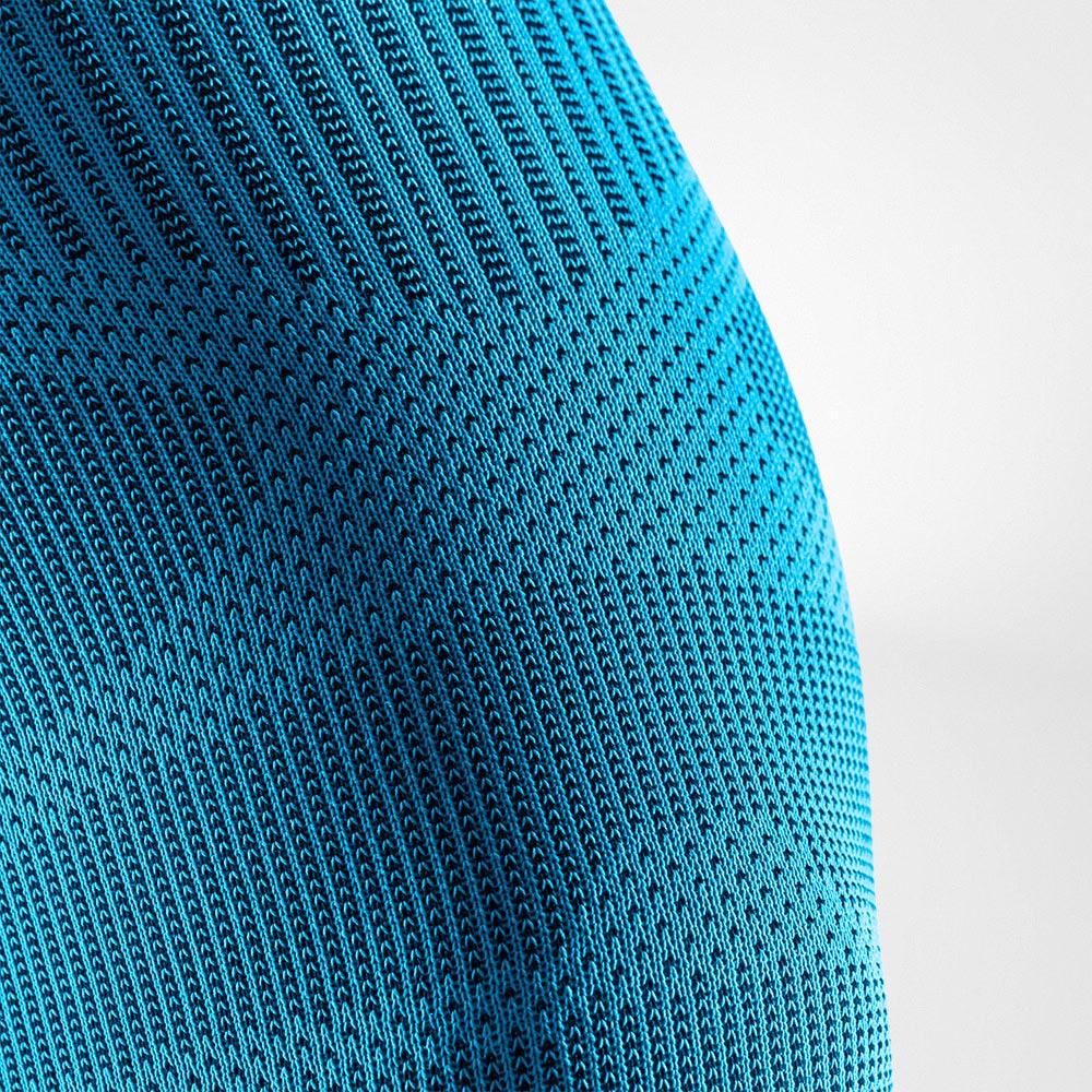 Close-up of blue extra breathable knit fabric texture 