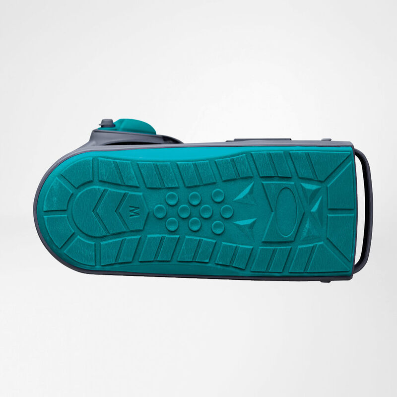 Teal portable Bluetooth speaker with intricate geometric design on its treaded base