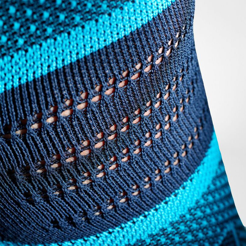 Close up of the breathable blue and teal Sports Knee Support knit