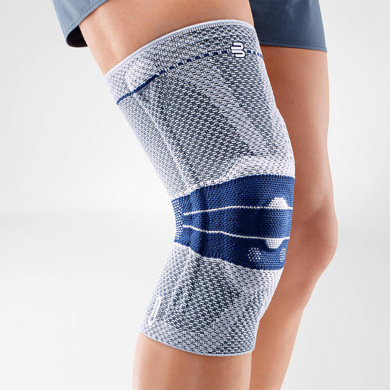 Close-up image of a person wearing Bauerfeind's titan GenuTrain A3 arthritis knee brace.