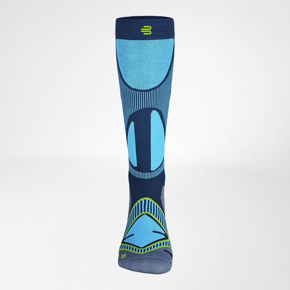 Blue and navy compression sock with green accents, front view.