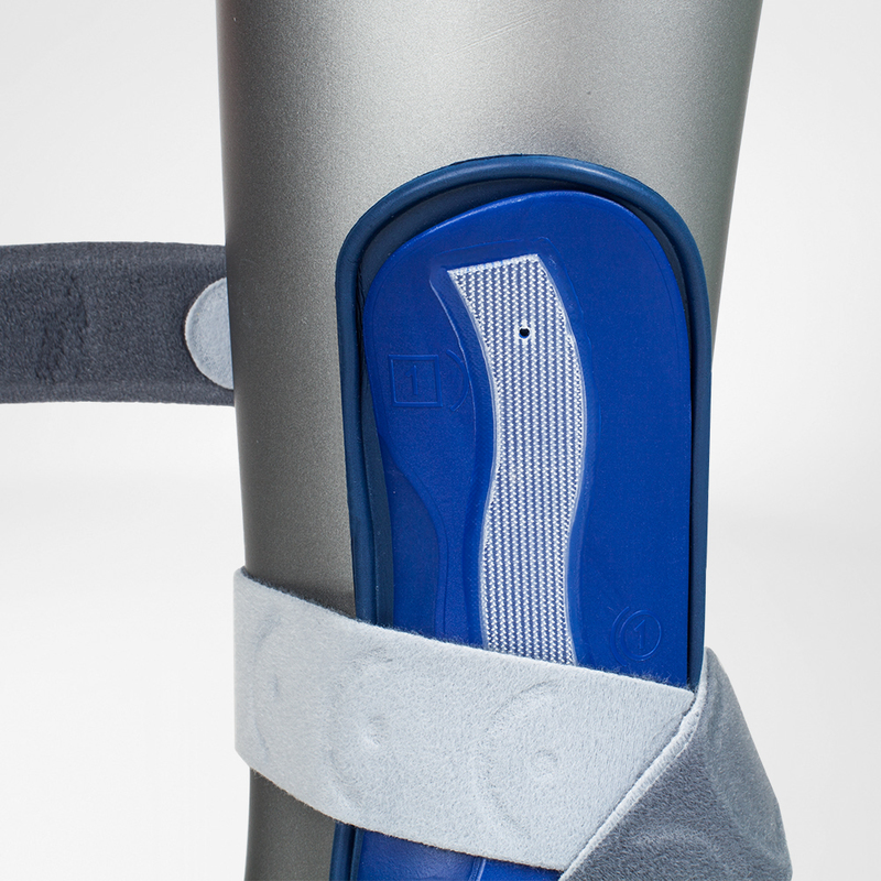 Close-up of a blue MalleoLoc Ankle Stirrup Brace with gray Velcro straps.