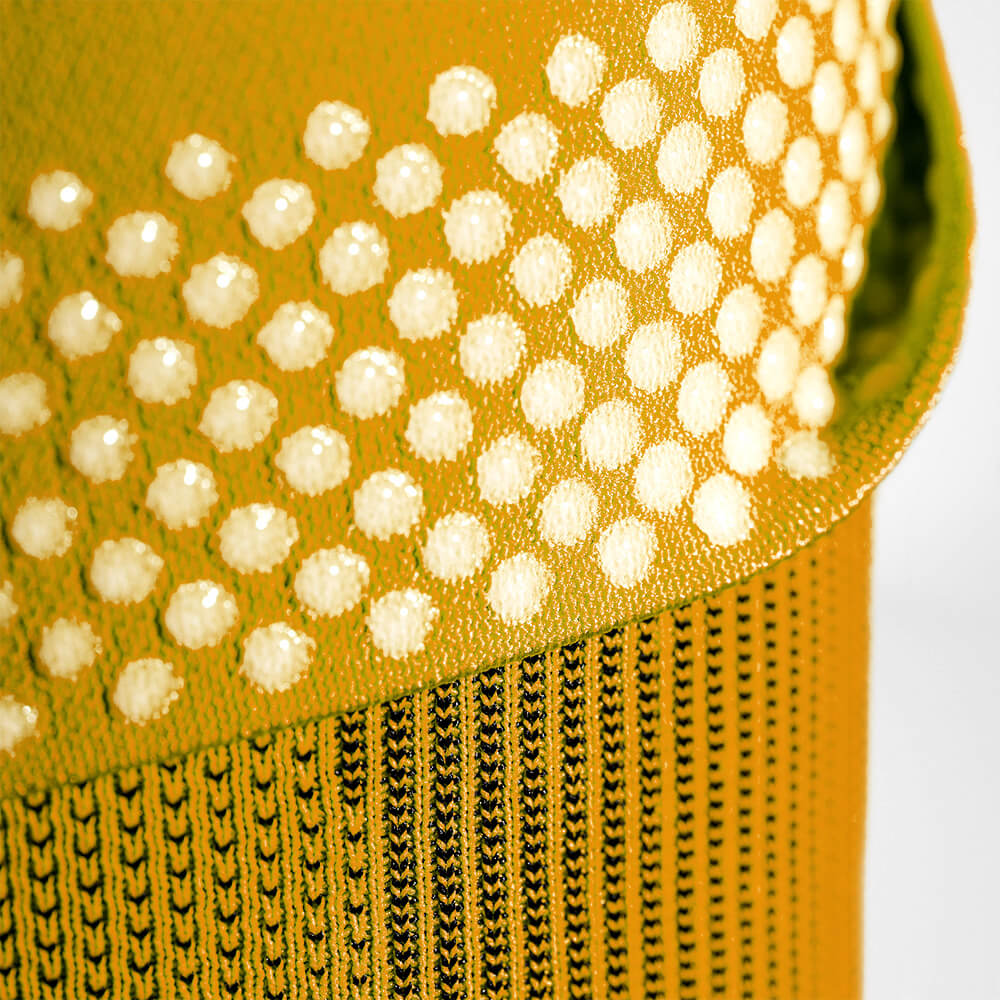 Close-up of the silicone-dotted gripping zones found on Bauerfeind's Sports Compression Knee Support NBA Lakers Edition.