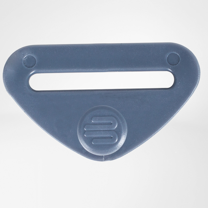 Grey plastic buckle accessory with a single horizontal slot and round embossed logo on the front.