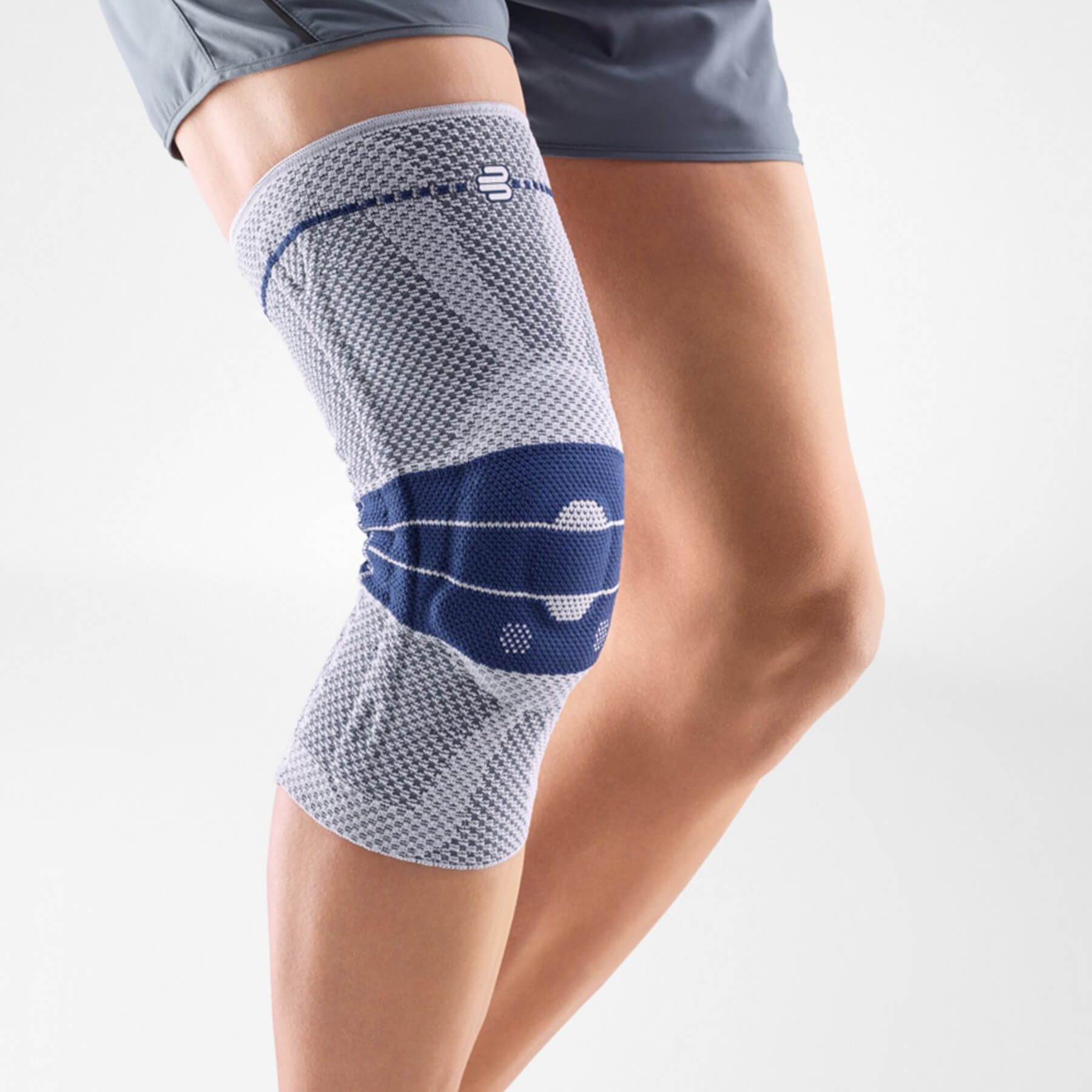 Image of our knee brace GenuTrain worn on a knee